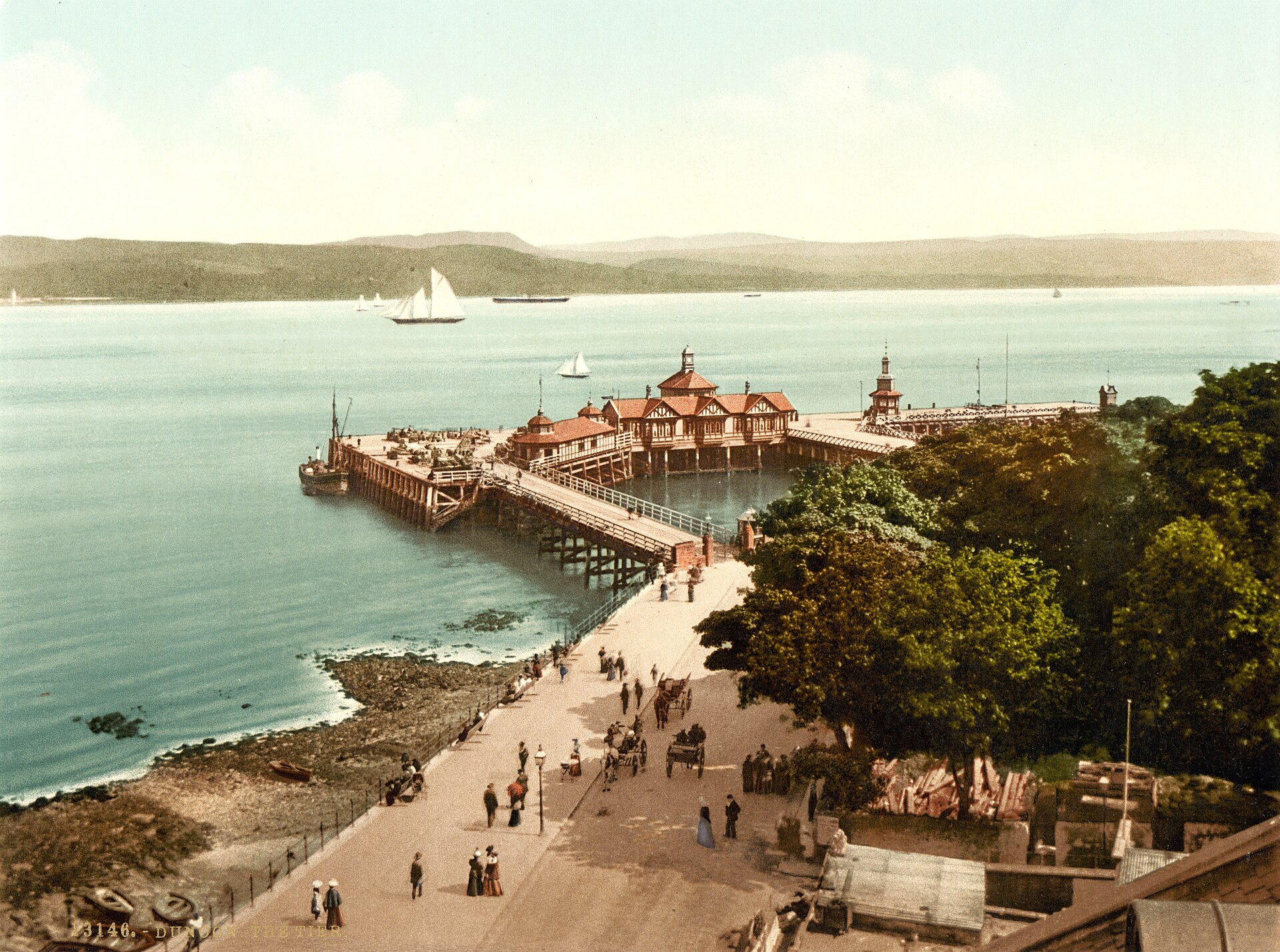 Victorian-era view of Dunoon Pier crowded with passengers awaiting a Clyde steamer.